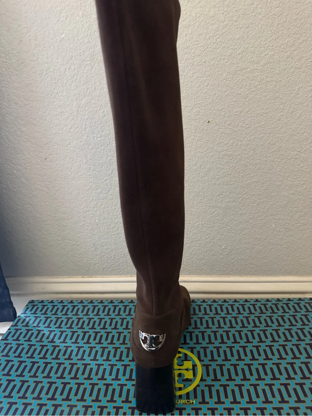 Tory Burch elegant knee